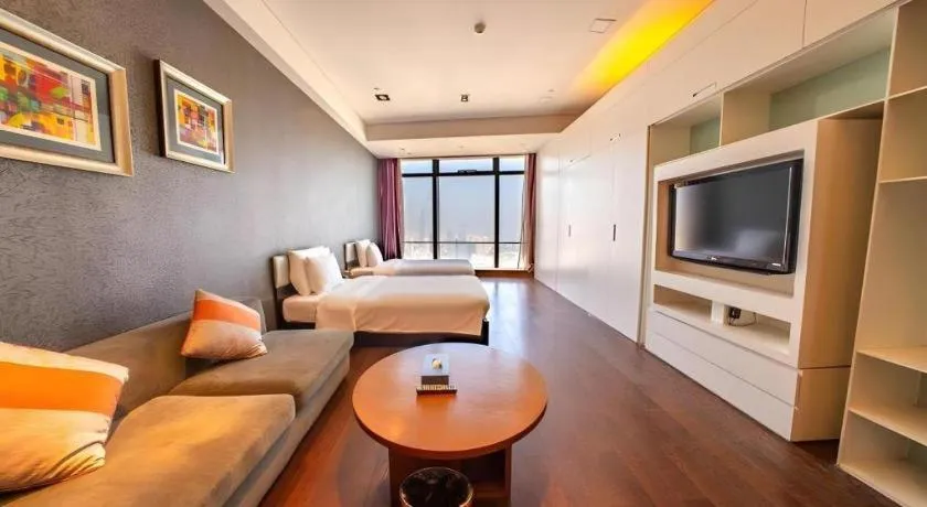 Bed in Grand Madison Qingdao Harbour-view Central（Former Qingdao Farglory Hotel）