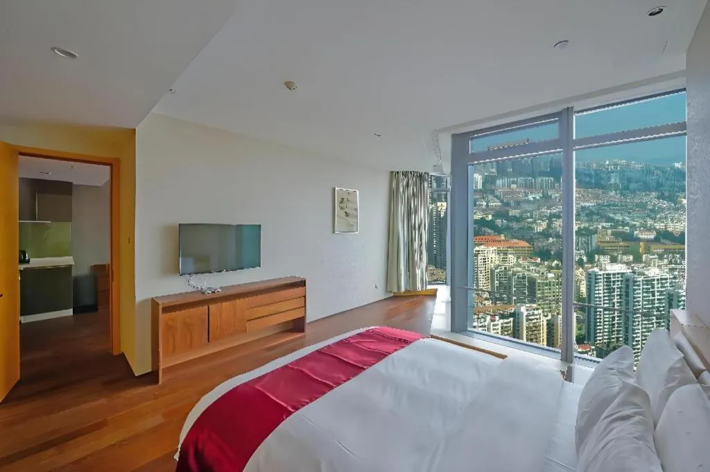 Bed in Grand Madison Qingdao Harbour-view Central（Former Qingdao Farglory Hotel）