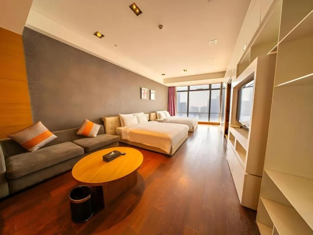 Bed in Grand Madison Qingdao Harbour-view Central（Former Qingdao Farglory Hotel）