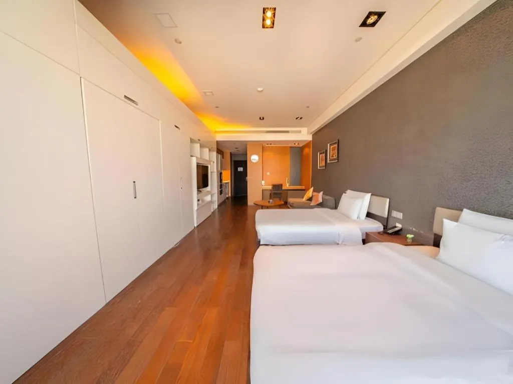Bed in Grand Madison Qingdao Harbour-view Central（Former Qingdao Farglory Hotel）