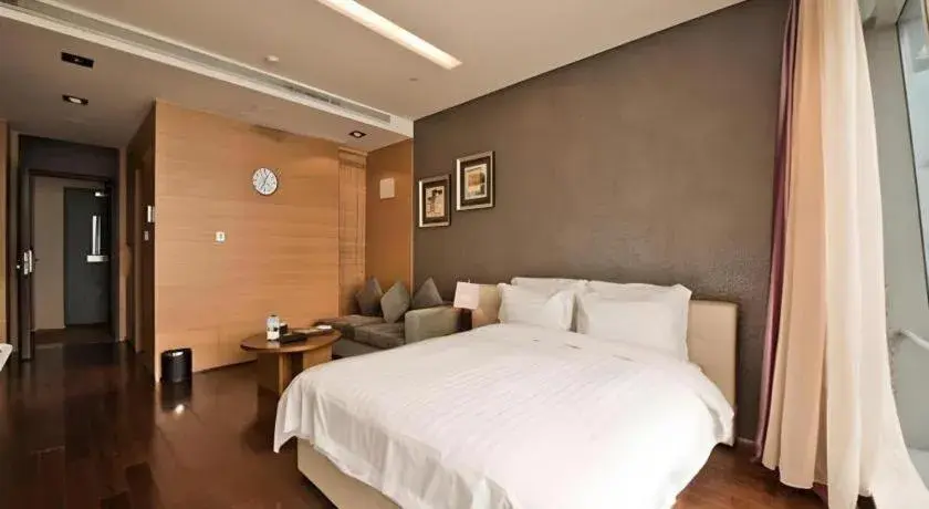 Bed in Grand Madison Qingdao Harbour-view Central(Former Qingdao Farglory Hotel) Bed in Grand Madison Qingdao Harbour-view Central(Former Qingdao Farglory Hotel)