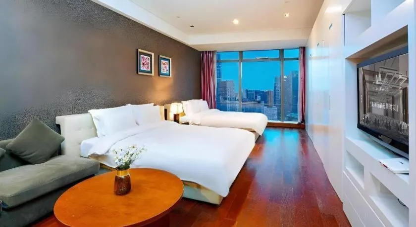 Bed in Grand Madison Qingdao Harbour-view Central（Former Qingdao Farglory Hotel）
