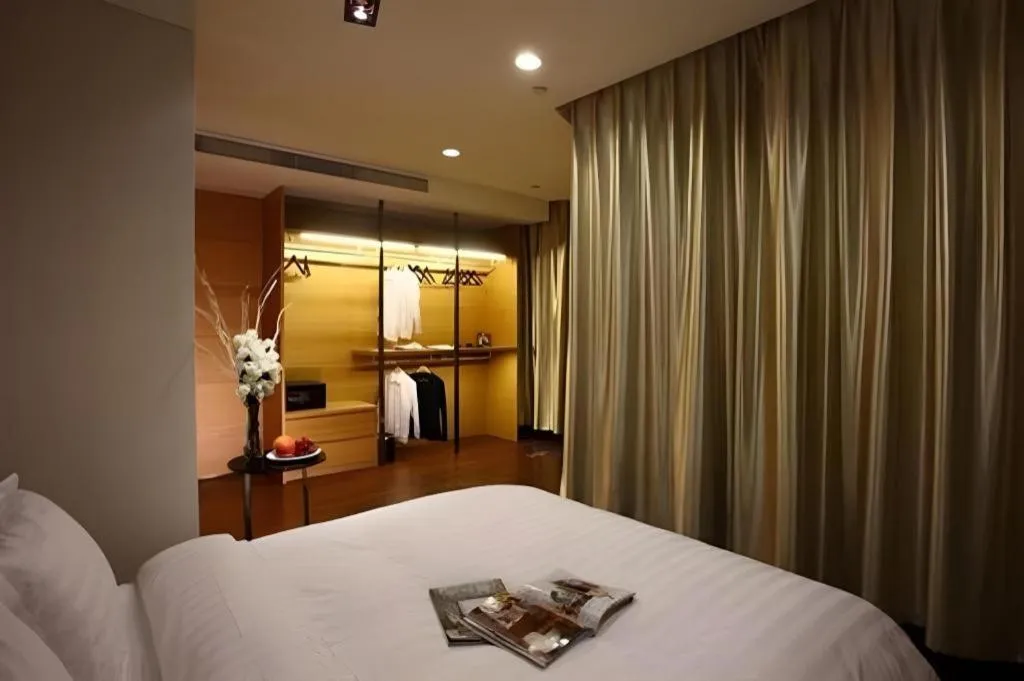 Bed in Grand Madison Qingdao Harbour-view Central（Former Qingdao Farglory Hotel）
