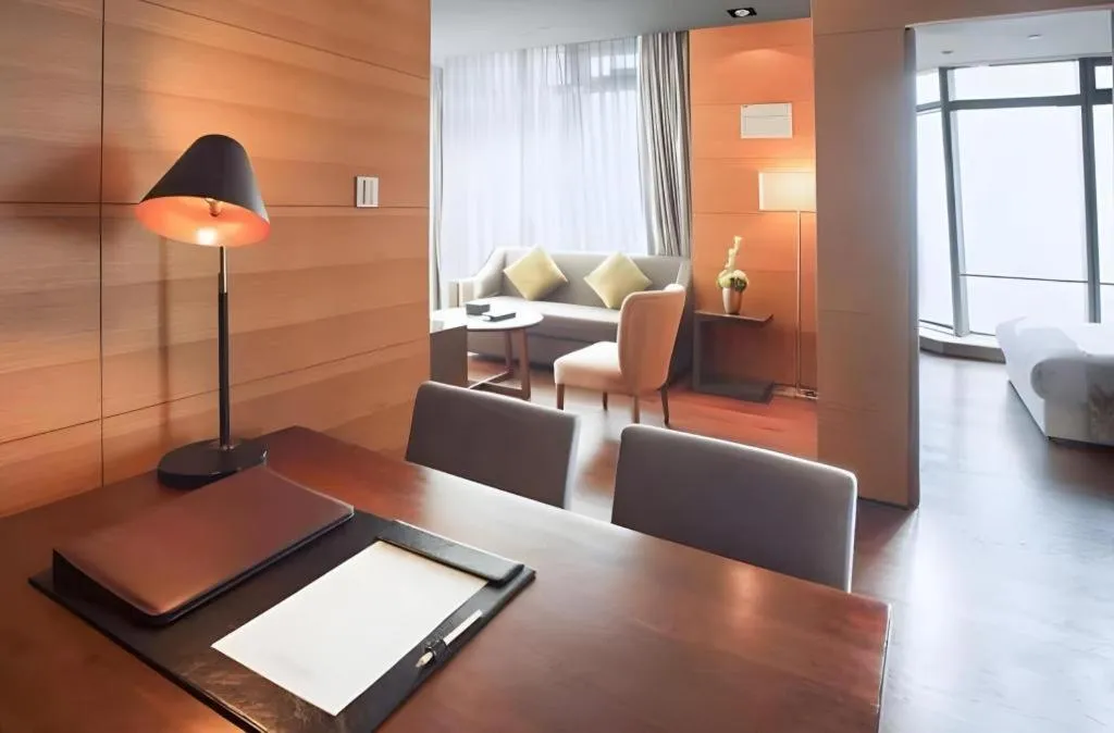 Bed in Grand Madison Qingdao Harbour-view Central（Former Qingdao Farglory Hotel）