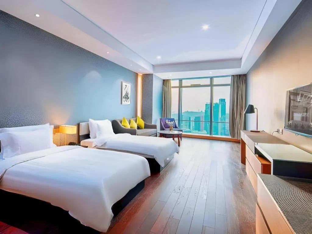 Bed in Grand Madison Qingdao Harbour-view Central（Former Qingdao Farglory Hotel）