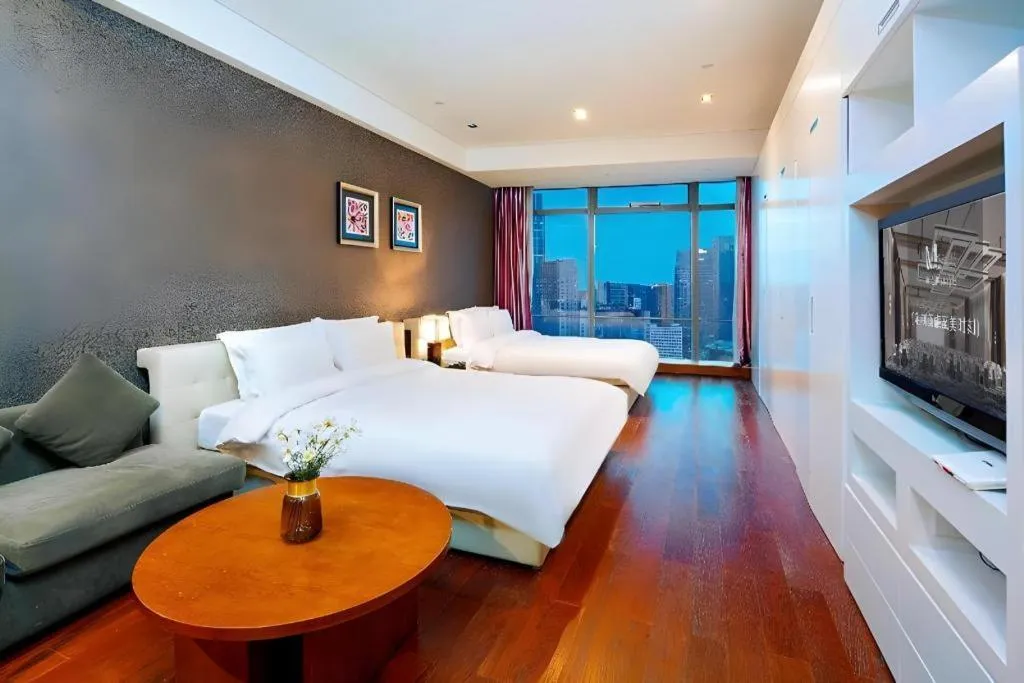 Bed in Grand Madison Qingdao Harbour-view Central（Former Qingdao Farglory Hotel）