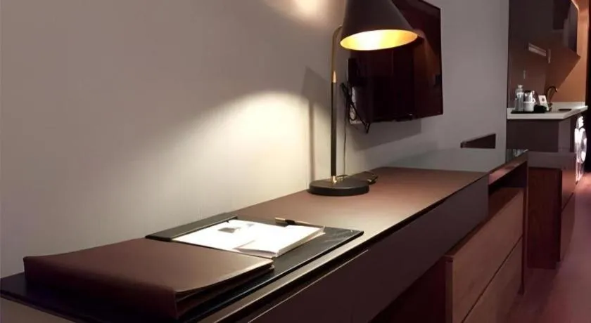 Bed in Grand Madison Qingdao Harbour-view Central（Former Qingdao Farglory Hotel）