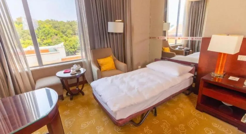 Bed in Quanzhou Guest House Hotel