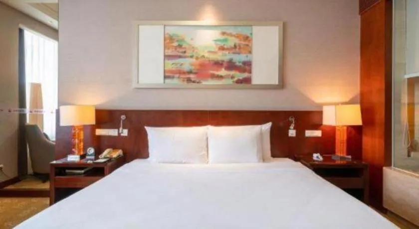 Bed in Quanzhou Guest House Hotel