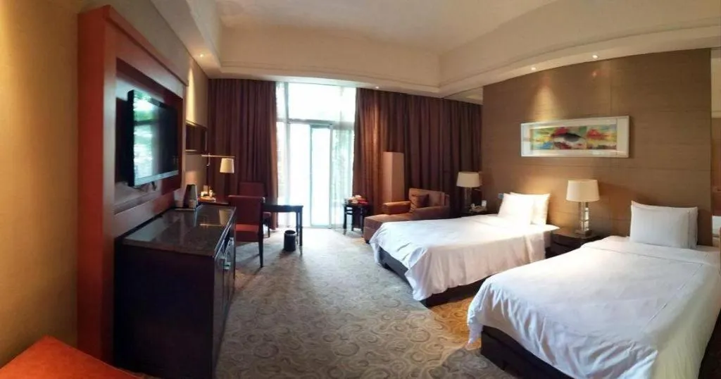Bed in Quanzhou Guest House Hotel