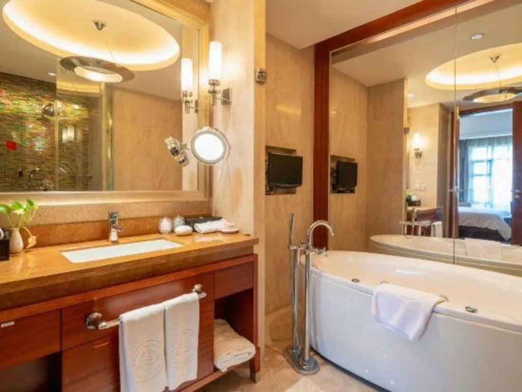 Bed in Quanzhou Guest House Hotel