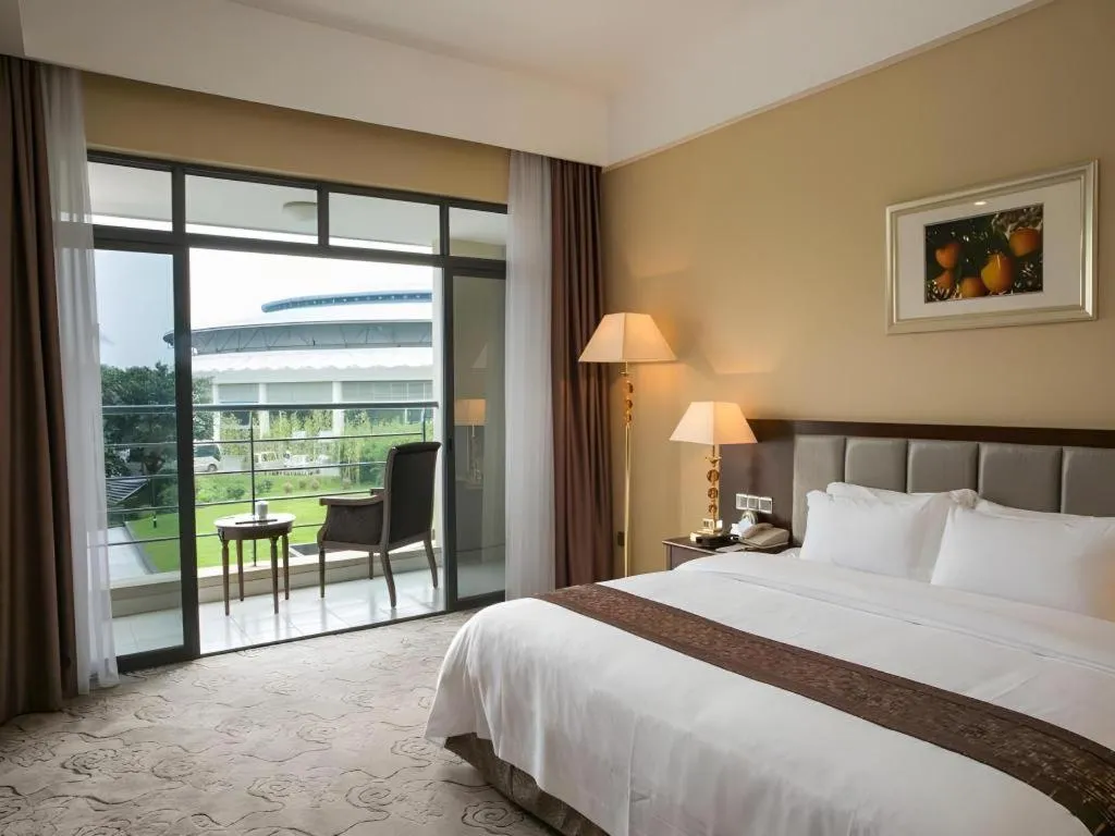 Bed in Kecheng Holiday Hotel