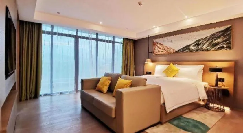 Bed in Kecheng Holiday Hotel