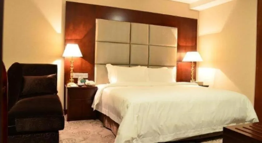 Bed in Kecheng Holiday Hotel