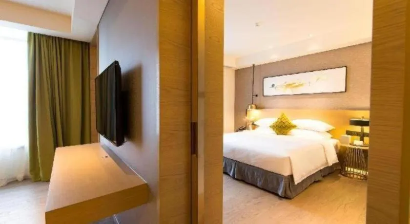 Bed in Kecheng Holiday Hotel