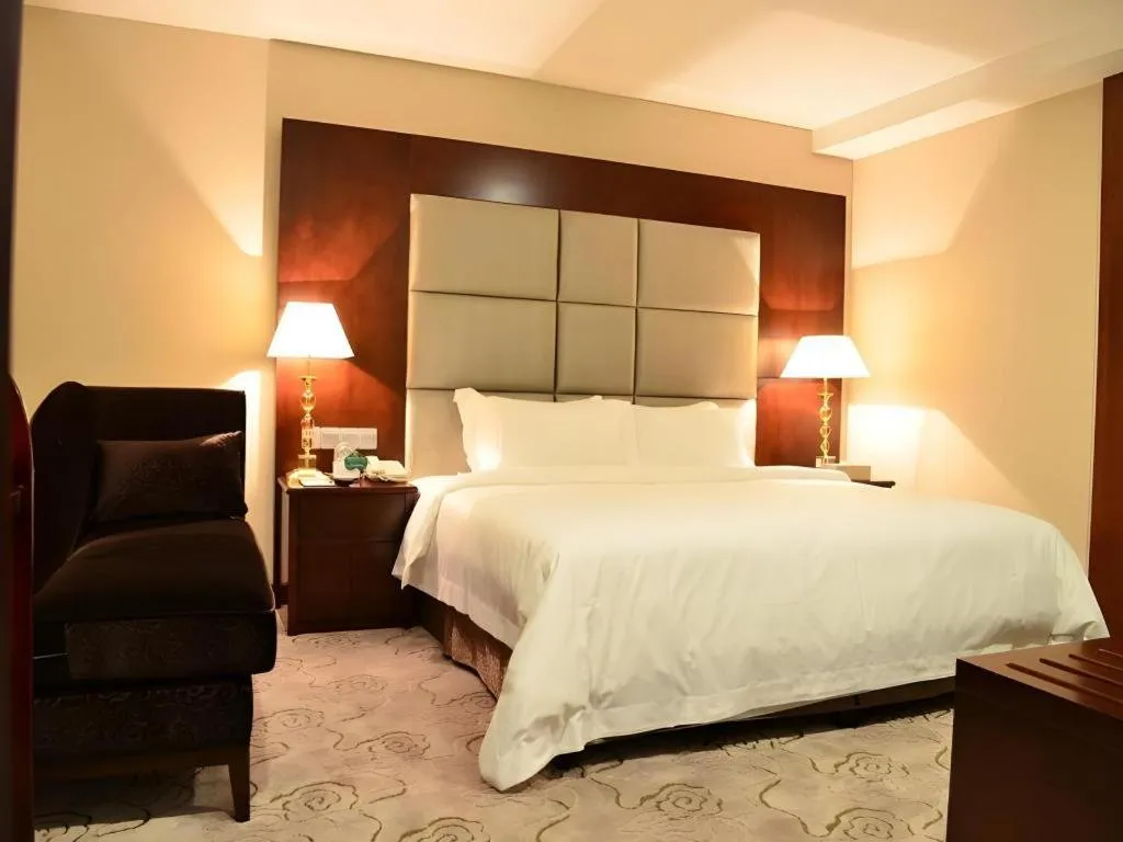 Bed in Kecheng Holiday Hotel