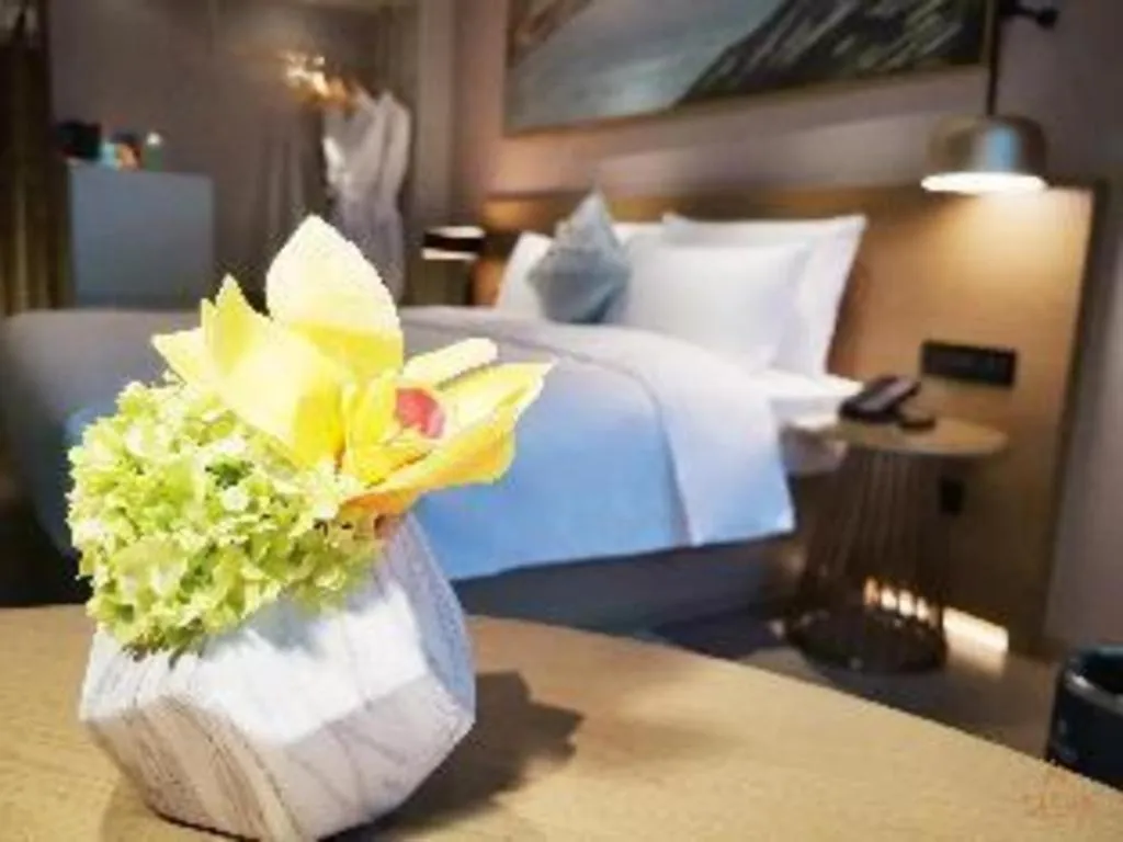 Bed in Kecheng Holiday Hotel