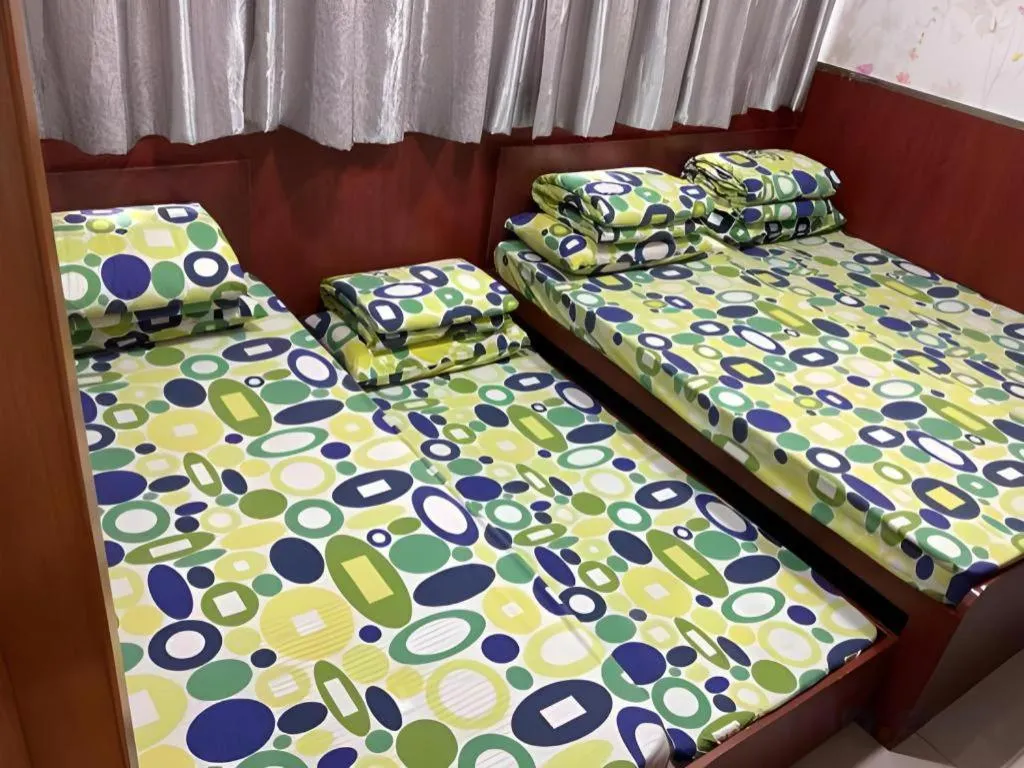 Bed in New Mong Kok Guest House