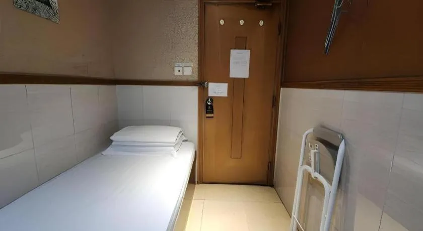 Bed in New Mong Kok Guest House
