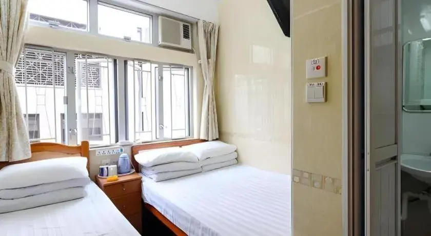 Bed in New Mong Kok Guest House Bed in New Mong Kok Guest House