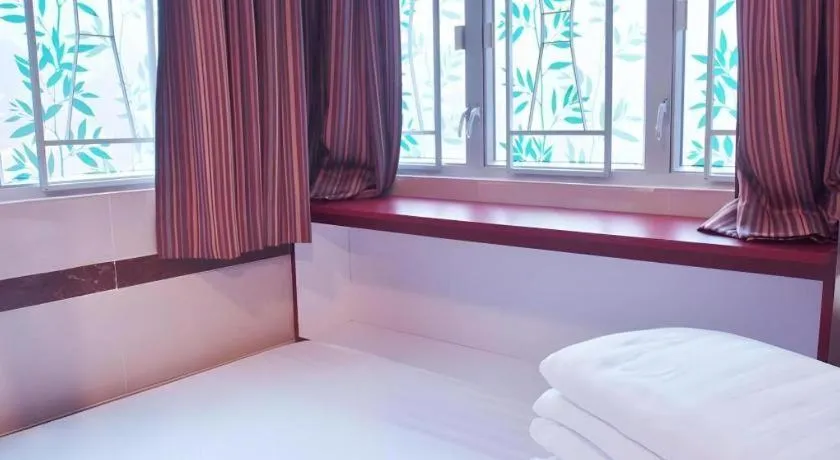 Bed in New Mong Kok Guest House