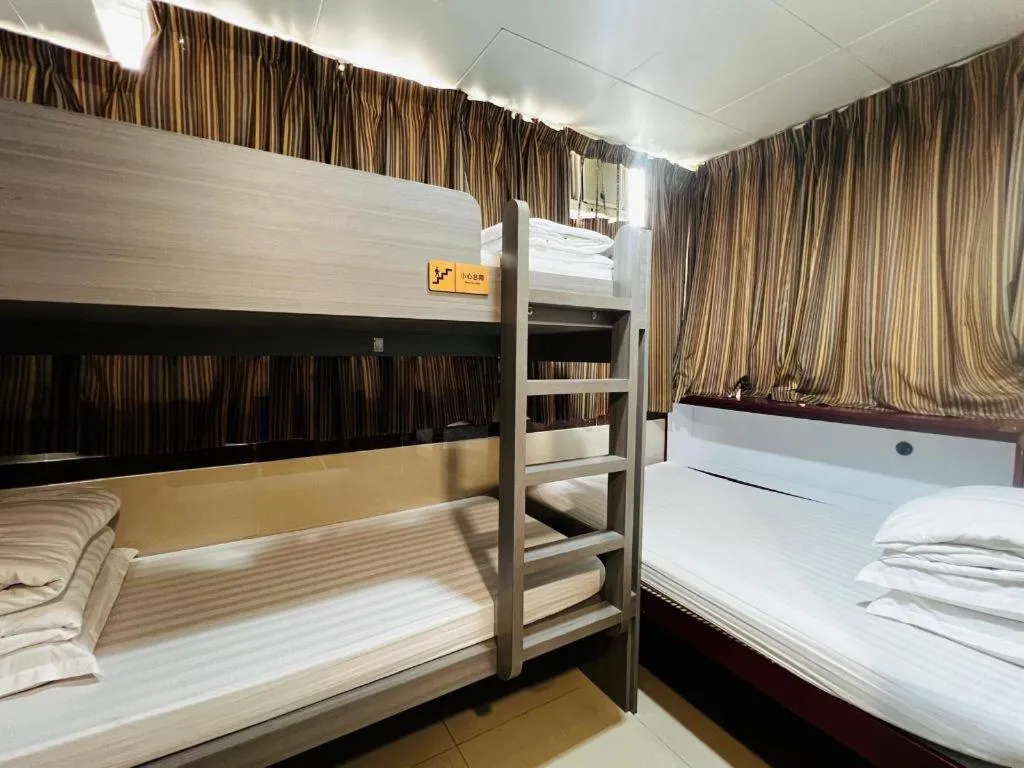 Bed in New Mong Kok Guest House