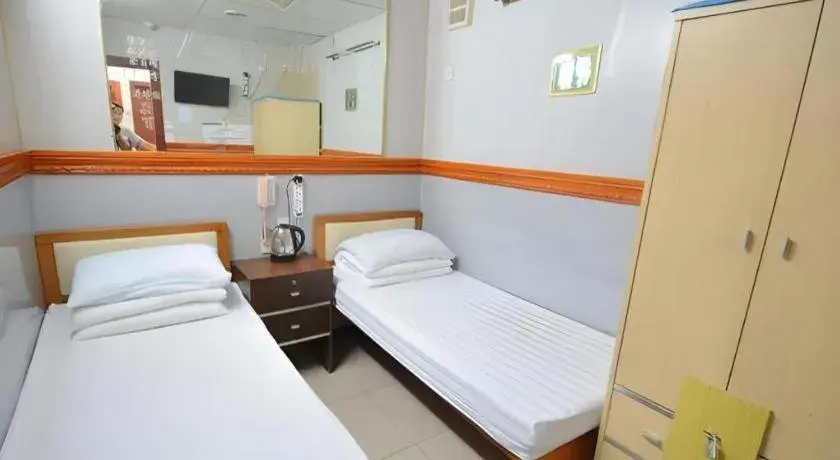 Bed in New Mong Kok Guest House Bed in New Mong Kok Guest House