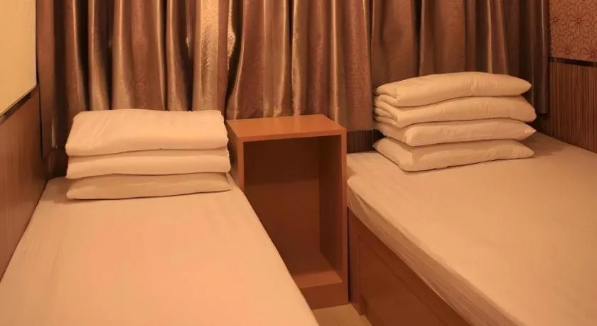 Bed in New Mong Kok Guest House