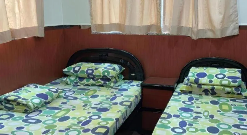 Bed in New Mong Kok Guest House