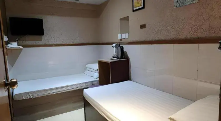 Bed in New Mong Kok Guest House Bed in New Mong Kok Guest House