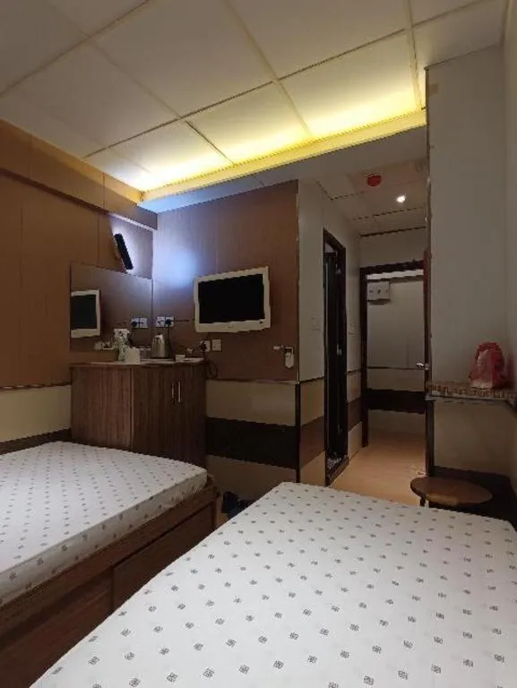 Bed in New Mong Kok Guest House