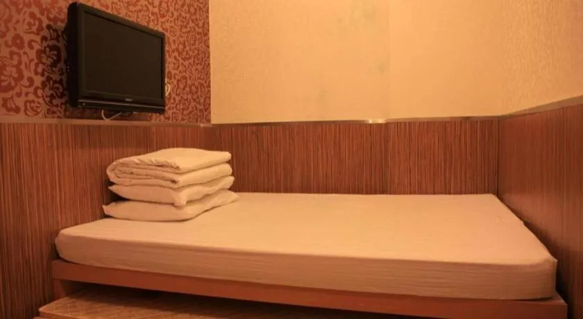 Bed in New Mong Kok Guest House