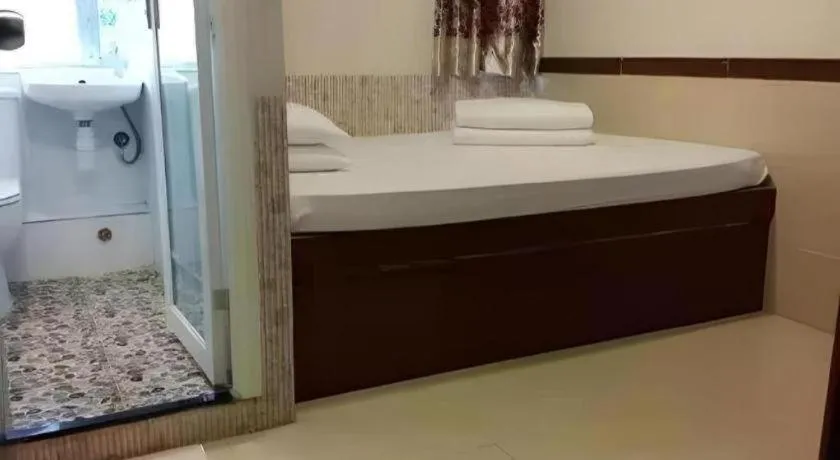 Bed in New Mong Kok Guest House