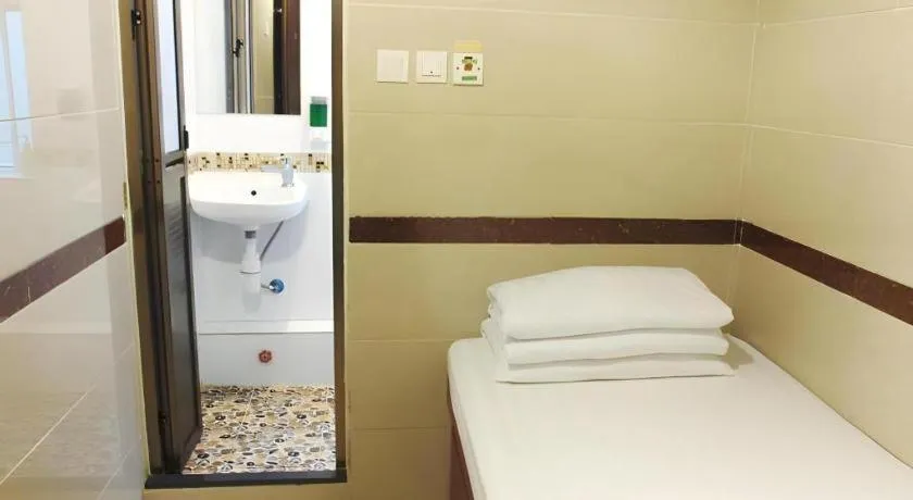 Bed in New Mong Kok Guest House