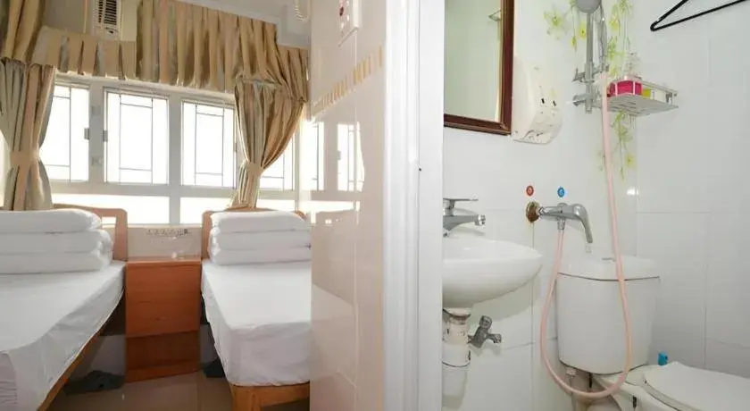 Bed in New Mong Kok Guest House Bed in New Mong Kok Guest House