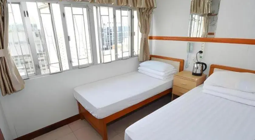 Bed in New Mong Kok Guest House Bed in New Mong Kok Guest House