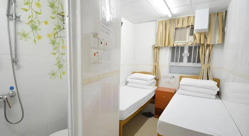 Bed in New Mong Kok Guest House