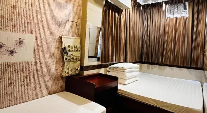 Bed in New Mong Kok Guest House Bed in New Mong Kok Guest House