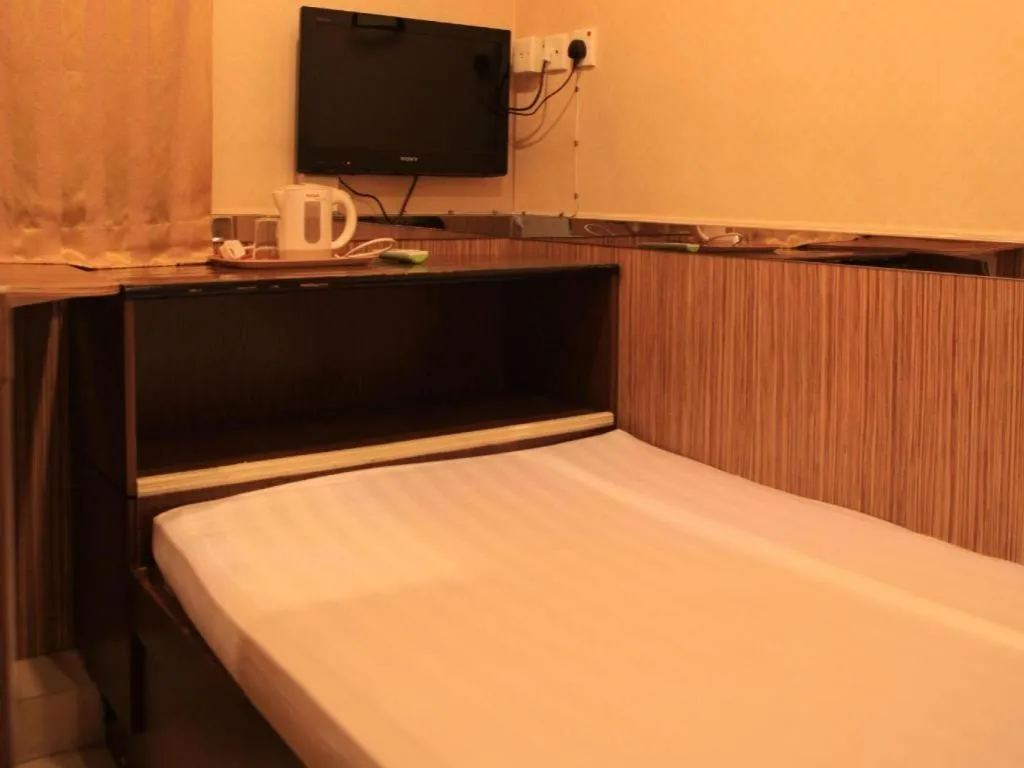 Bed in New Mong Kok Guest House