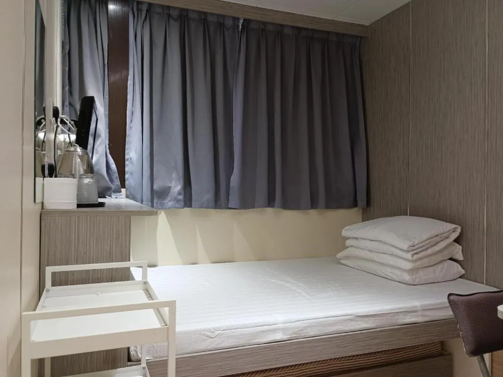Bed in New Mong Kok Guest House