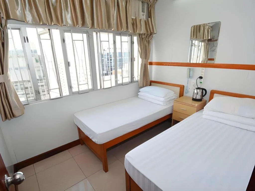 Bed in New Mong Kok Guest House