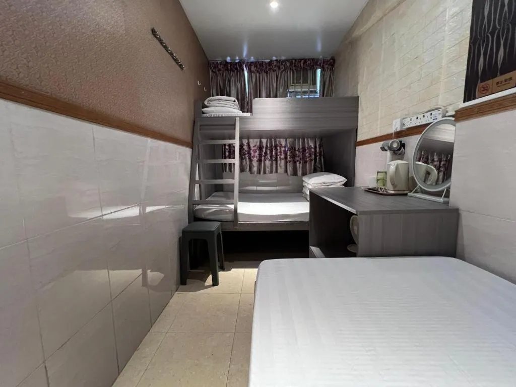 Bed in New Mong Kok Guest House