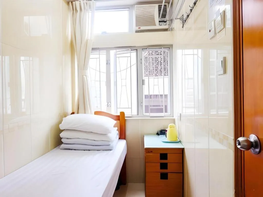 Bed in New Mong Kok Guest House