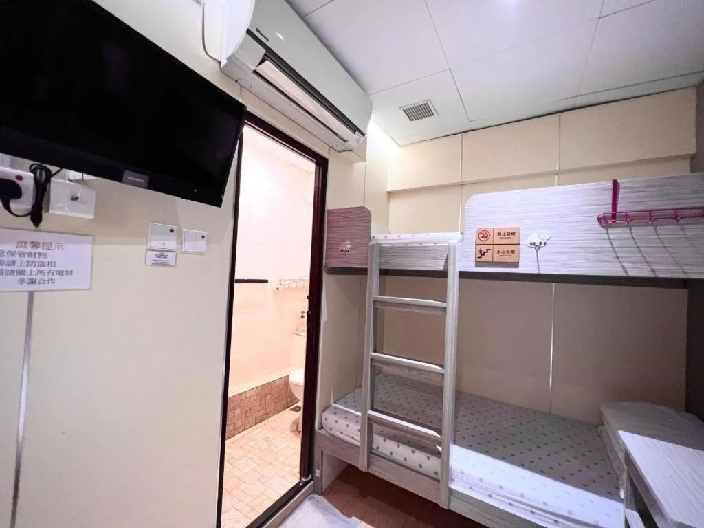 Bed in New Mong Kok Guest House