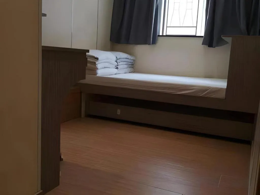 Bed in New Mong Kok Guest House