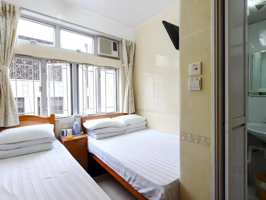 Bed in New Mong Kok Guest House