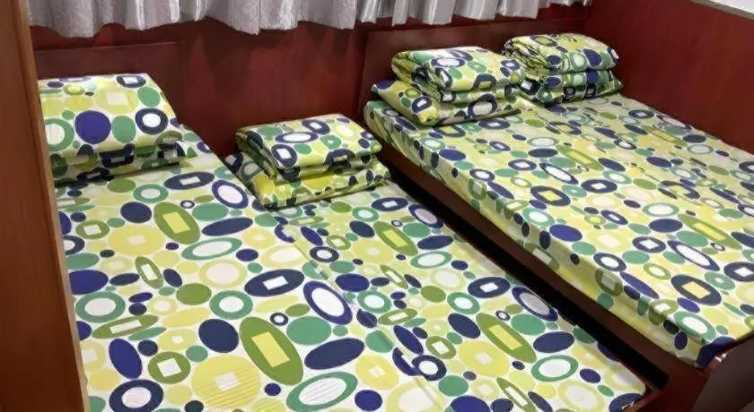 Bed in New Mong Kok Guest House