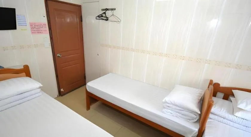 Bed in New Mong Kok Guest House