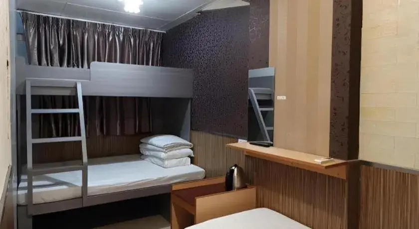 Bed in New Mong Kok Guest House Bed in New Mong Kok Guest House