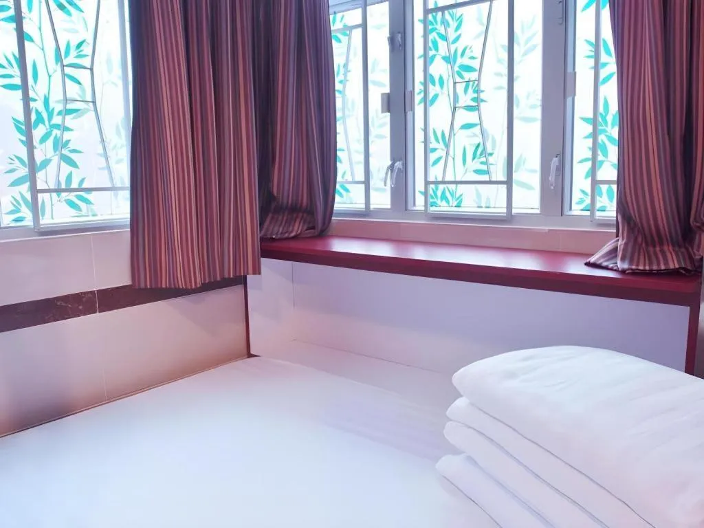 Bed in New Mong Kok Guest House